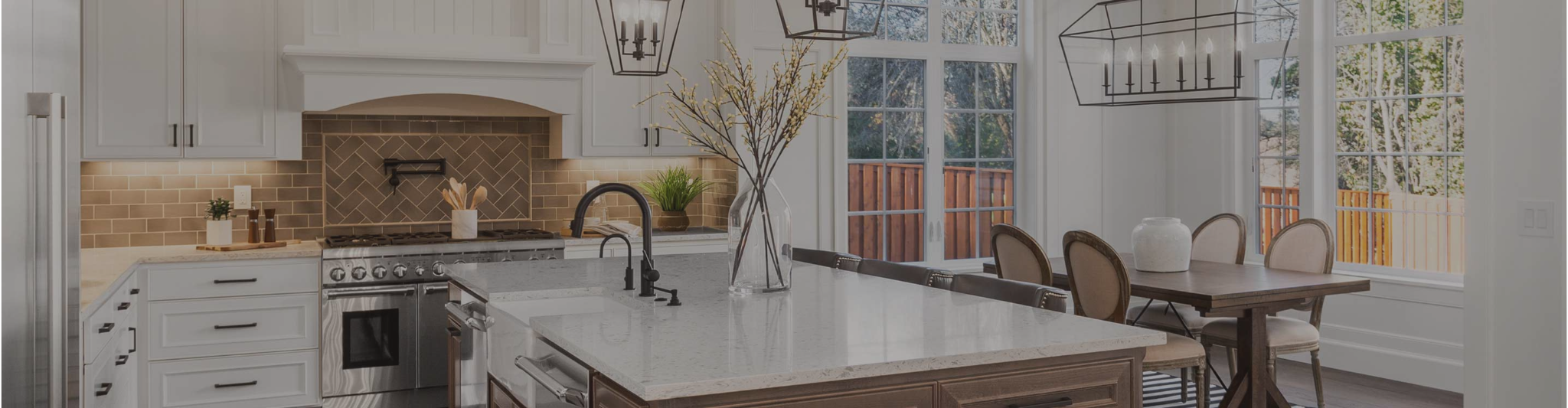 White countertops and a tile backsplash 